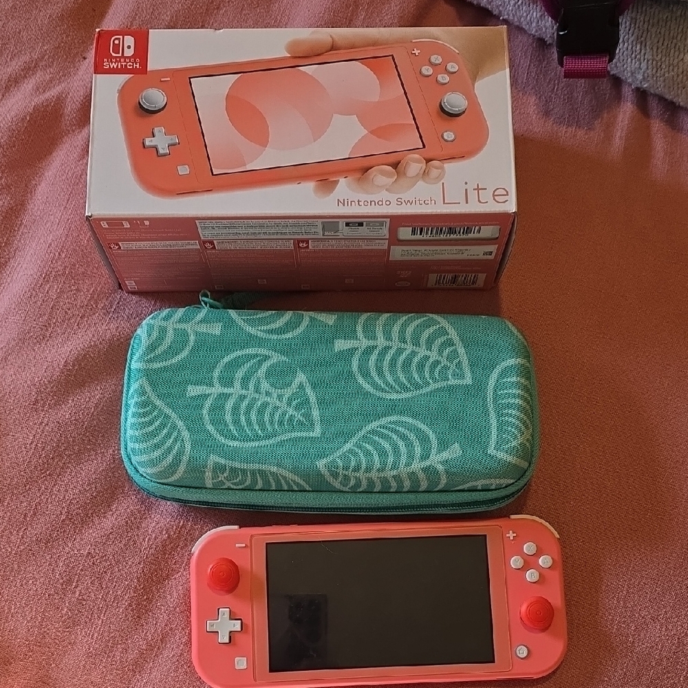 Nintendo Switch Lite in Coral with Case